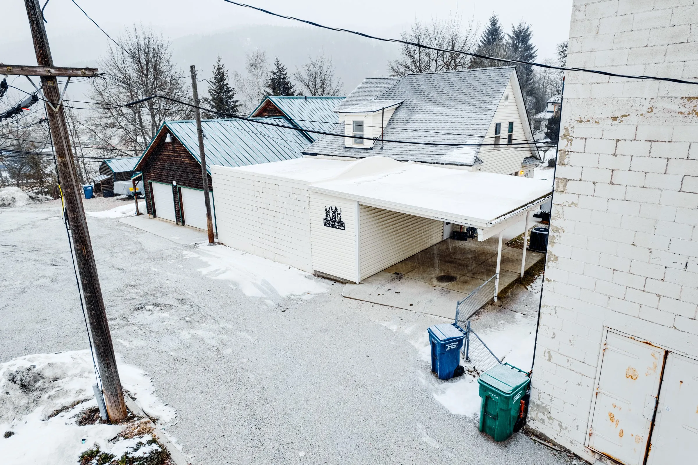 Covered carport and off-street parking off the alley behind Jackass Manor